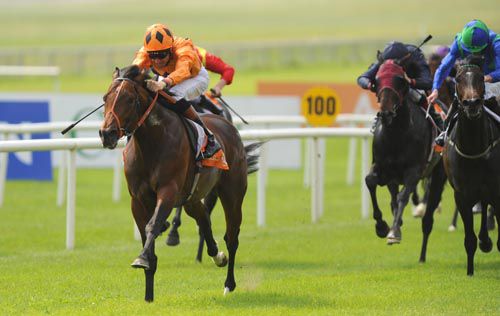 Canford Cliffs and Richard Hughes winning the 2000 Irish Guineas for trainer Richard Hannon 