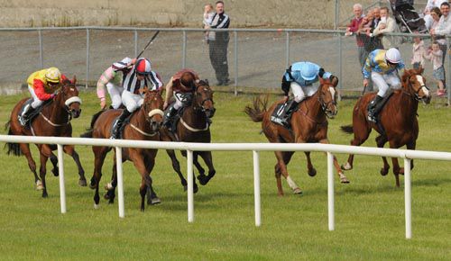 Declan McDonogh and Gpysy Rose (stripes) wins for trainer Kevin Prendergast