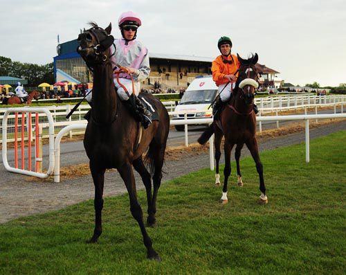 Lizzie Bennett (foreground) & winner Lady Bennett have their jobs done at Navan