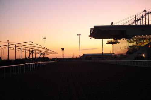 The setting sun provides the only light earlier this evening at Dundalk