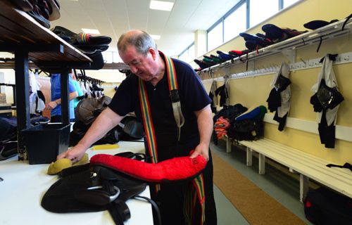 A jockey's valet at work at Galway