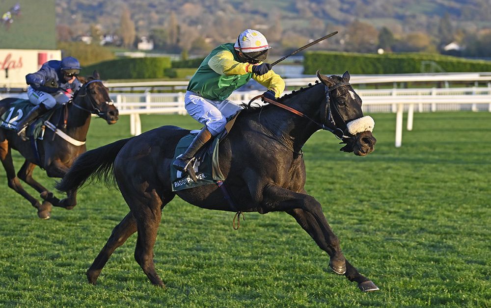 Unanswered and Peter Carberry win the Paddy Power Feel Like A Favourite Intermediate Handicap Hurdle at Cheltenham 