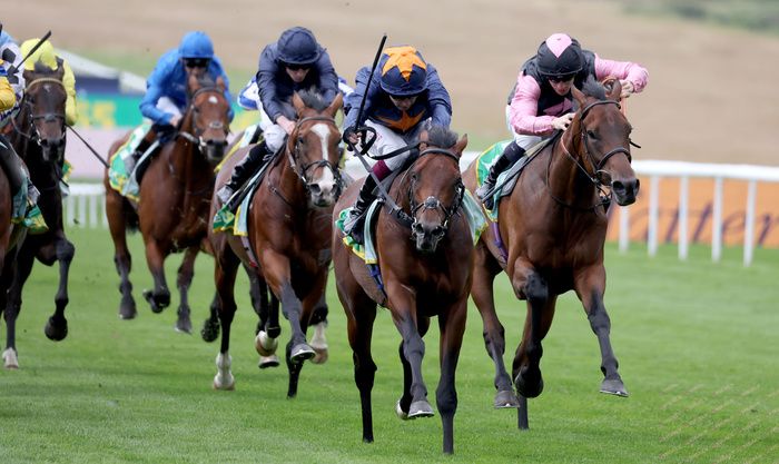 Involvement and Oisin Murphy (orange star on cap)