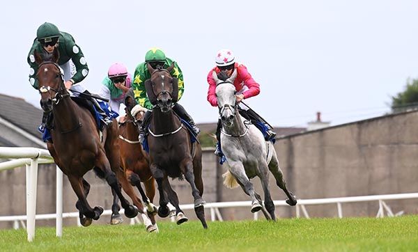 Around the halfway point in the opener at Tramore, with the grey Riviera Queen on the outer