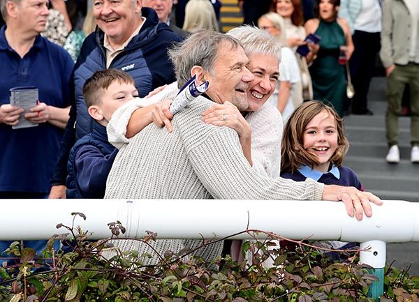 Harry Smyth is congratulated by daughter Emma and grandkids James and Maisie after Portnacoo's win  