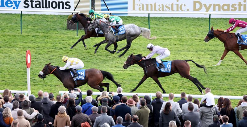 Alphonse Le Grande and Jamie Powell passing the line in front at Newmarket