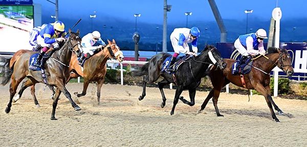 Ferrari Desert and Keithen Kennedy (right) win from Moyassr (centre) and Altimara (left) 