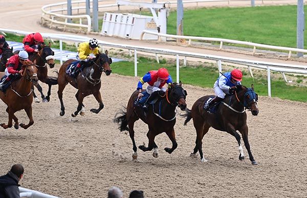 Sporting Hero and Nicola Burns (left) get the better of Land Lover and Joey Sheridan