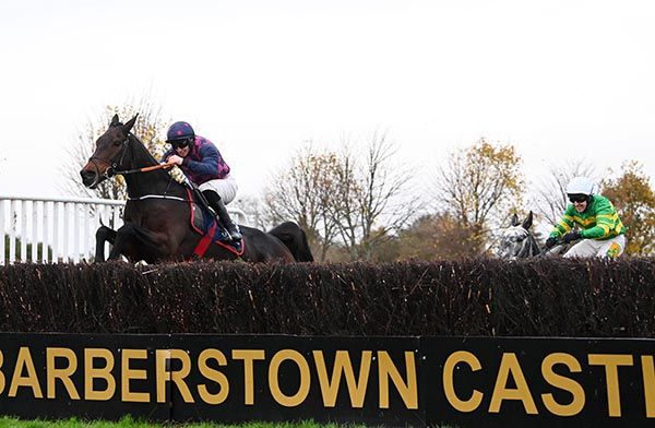 Farren Glory and Jack Kennedy jumping the last