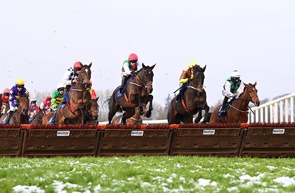 Taponthego (third from right) jumps the opening hurdle