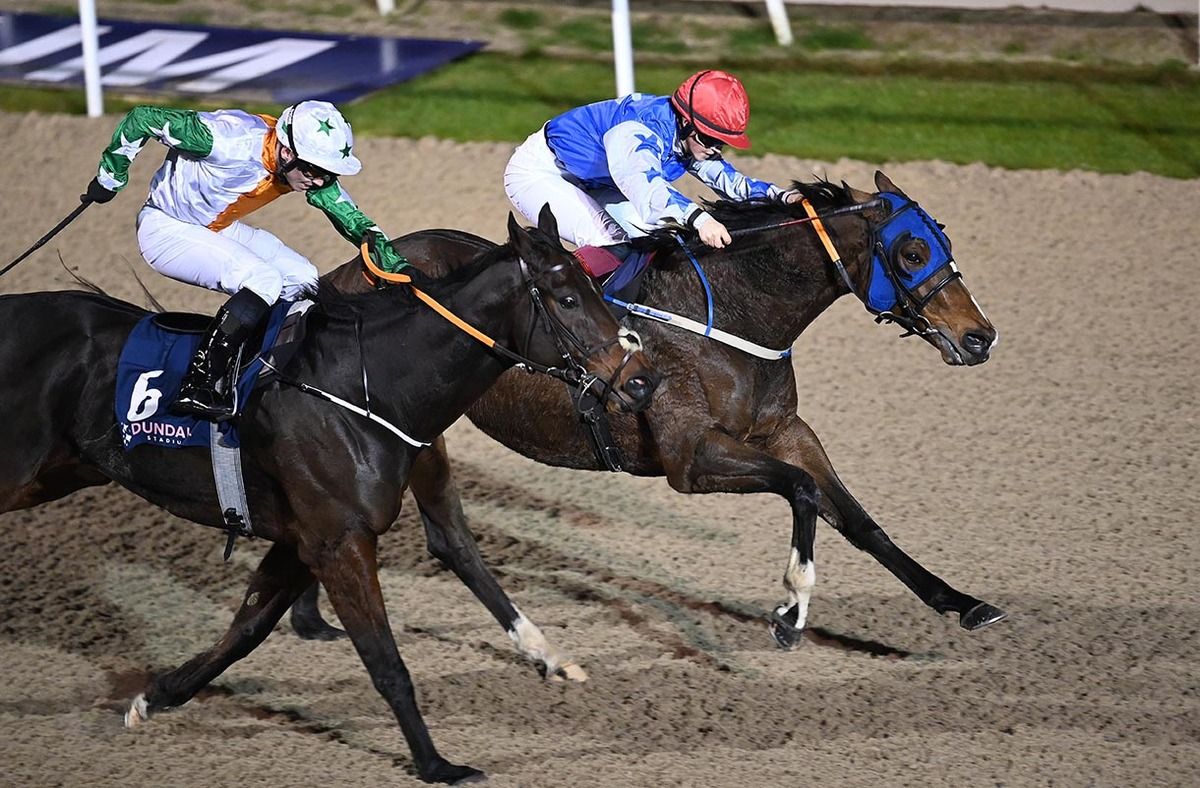 Sporting Hero (far side) is ridden out by Nicola Burns to beat Never Shout Never