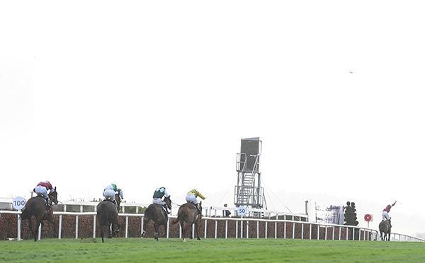 Sam Ewing salutes the crowd on Brighterdaysahead, right, as she comes home 30 lengths clear