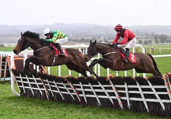 Slurricane and Tom Harney (red) beat Out For A Stroll 